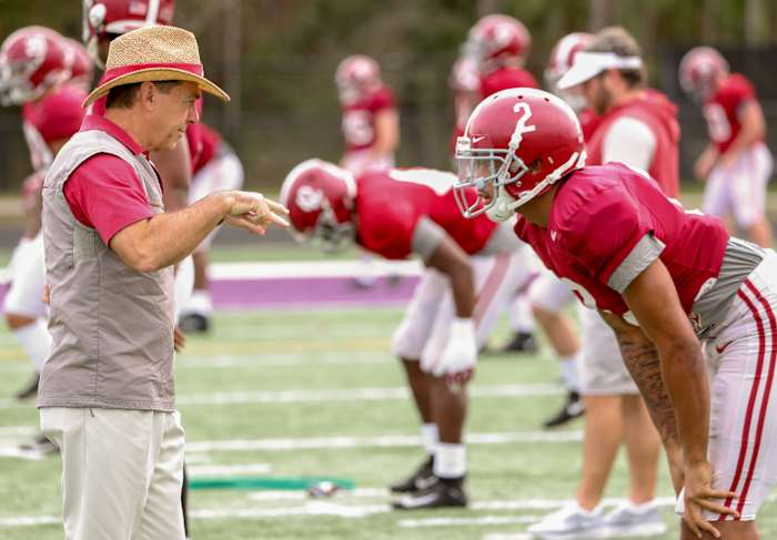 Nick Saban coaches Patrick Surtain II during a Citrus Bowl practice
